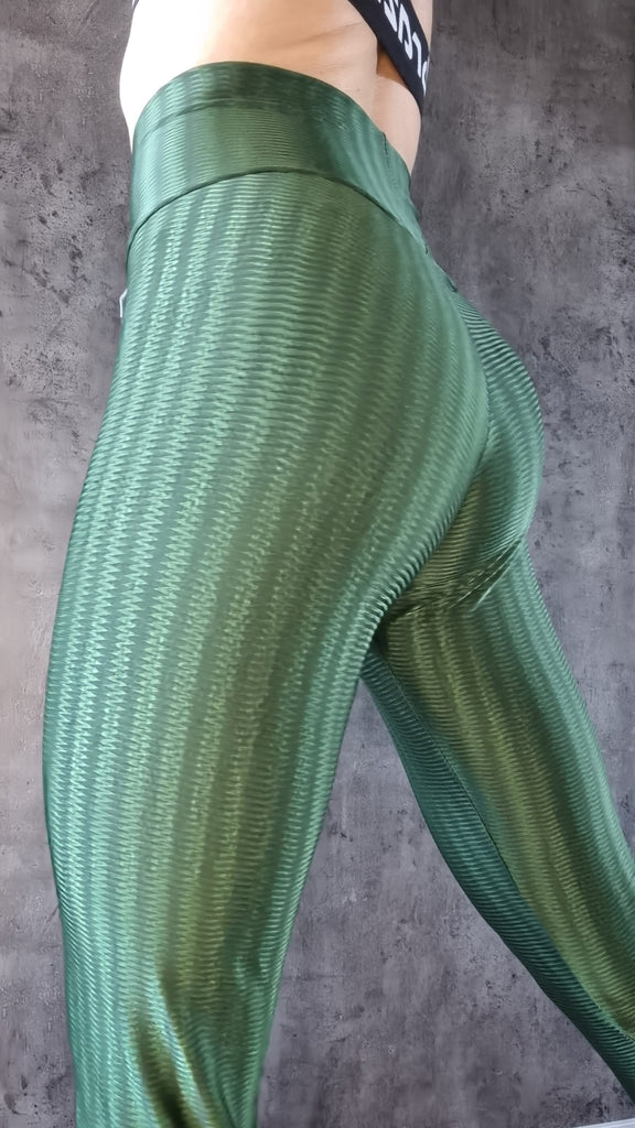 Elegant leggings in shiny Green